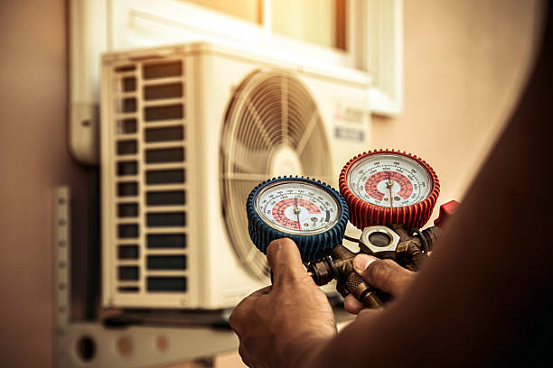 Professional Furnace Repair technician working in Sharpes, FL